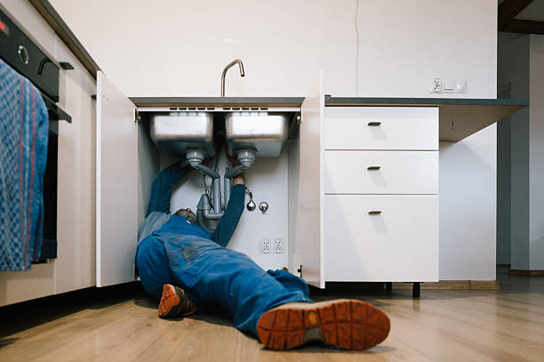 Professional Emergency Plumber technician working in Cobden, IL